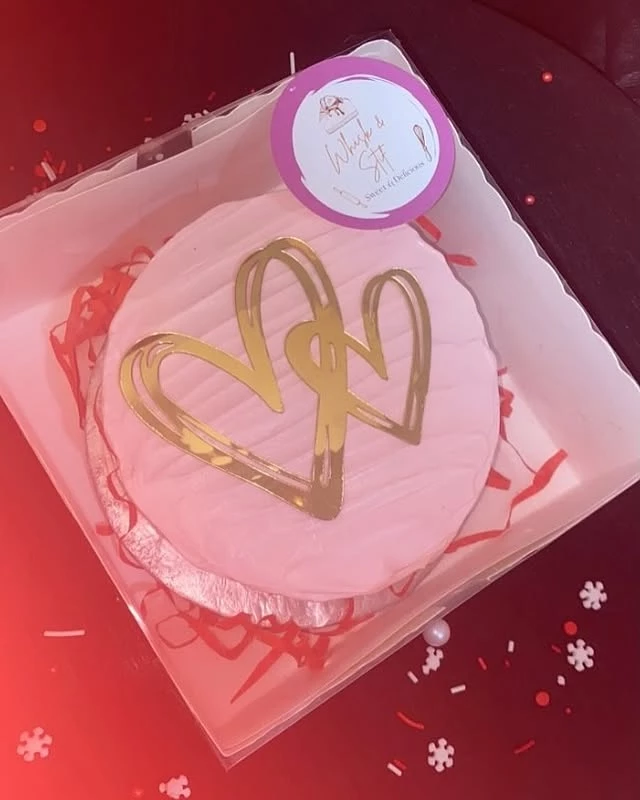 Anniversary cake heart shape with 'Wish a Sweet Childhoods' message and candy design - Heart Shape Cakes Karachi By Whisk And Sift